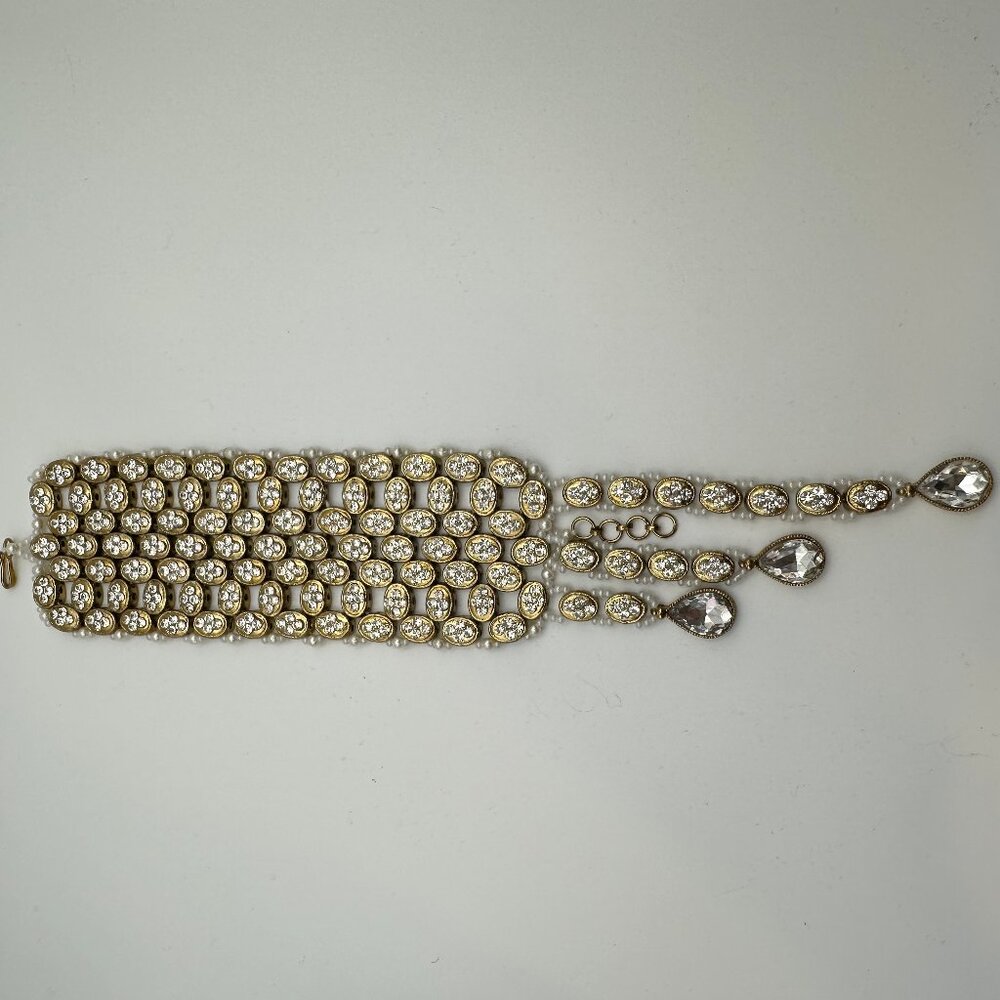 NWOT gold-toned bracelet with faux diamonds